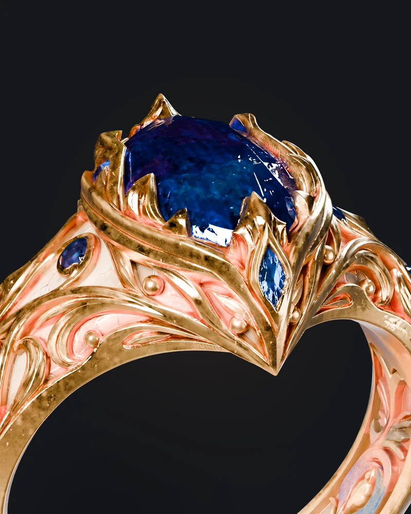 Close-up of the gemstone ring: gold prongs holding the deep-blue stone, with smaller blue stones set into the filigree shoulders.